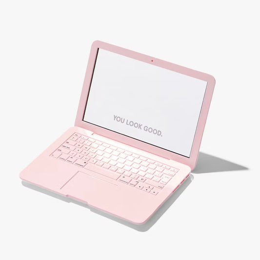 Glossier laptop mirror